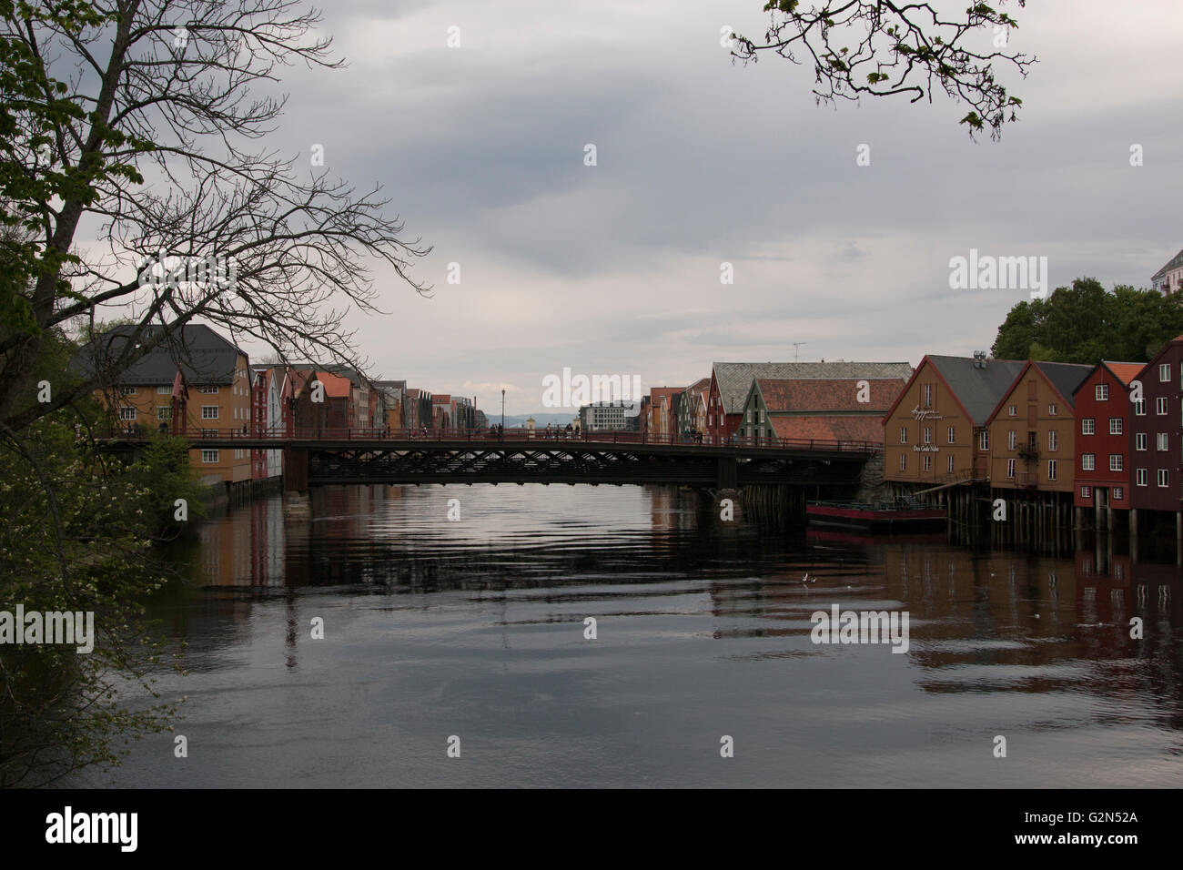 Old Town Bridge (Gamle Bybro)  and Nidelva river in Trondheim, Norway Norway on an overcast day. Stock Photo