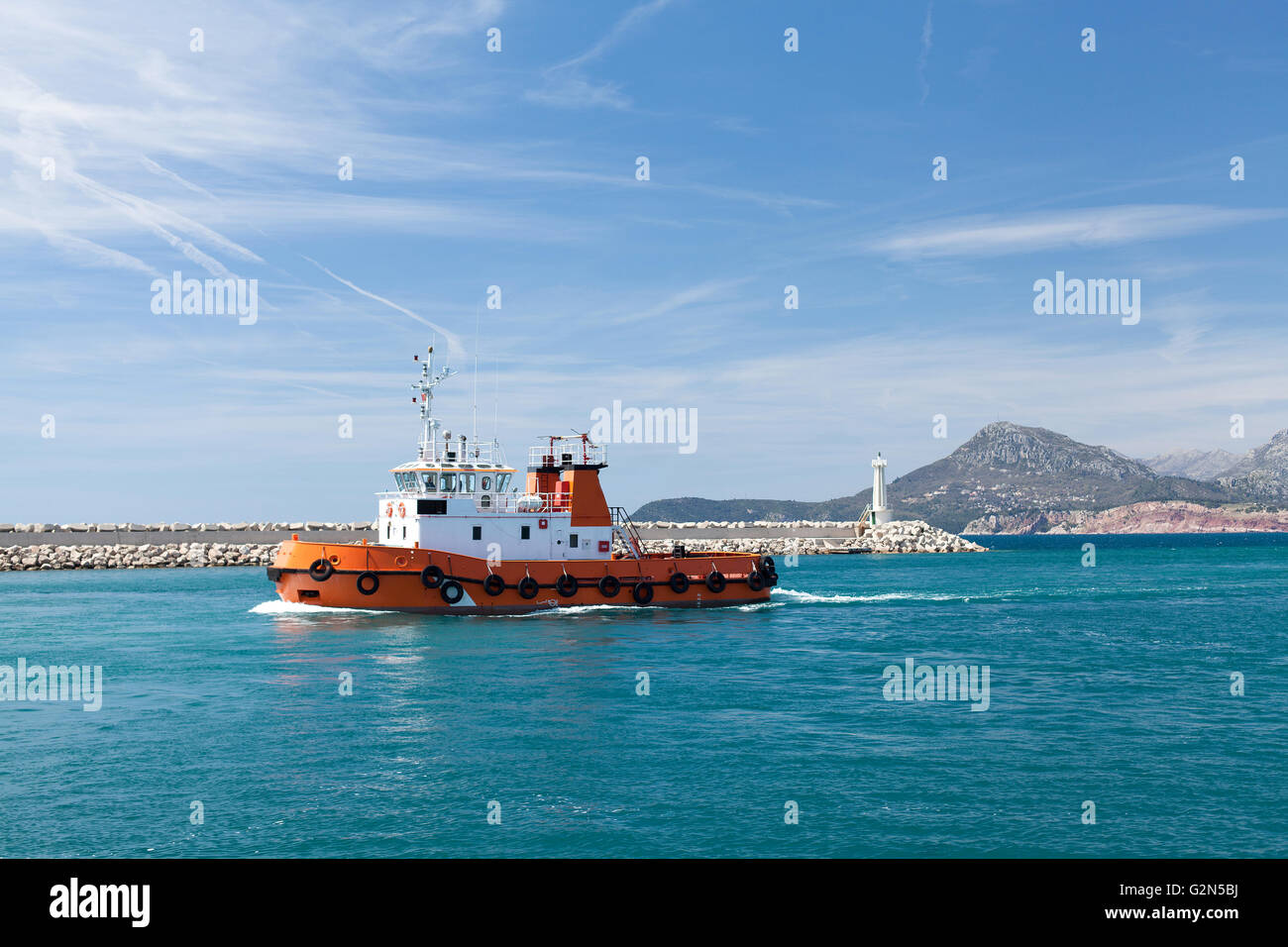 Tugboat in harbor of Montenegro Stock Photo