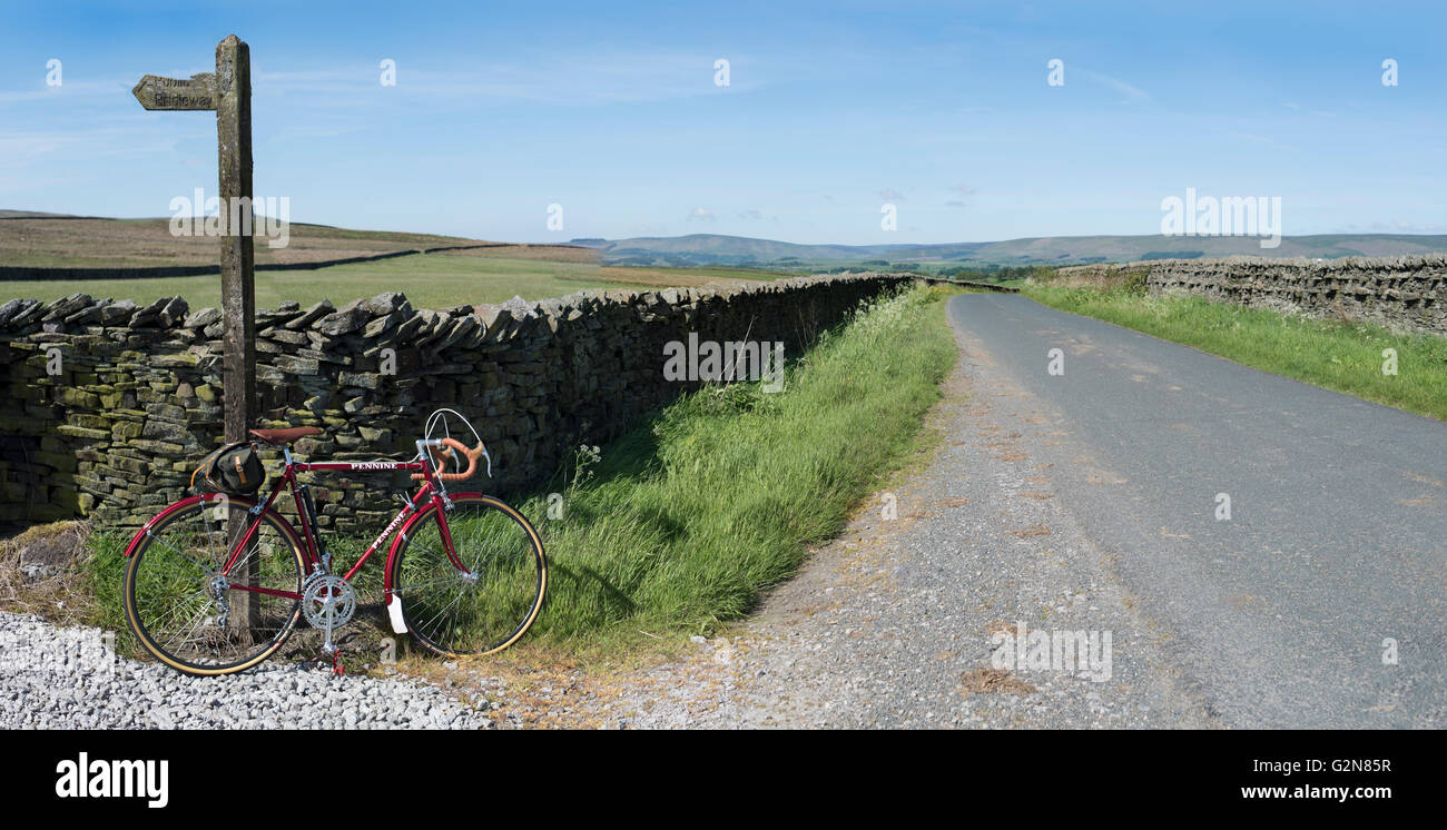 Cycling in Bowland on the first day of summer with vintage cycle. Stock Photo