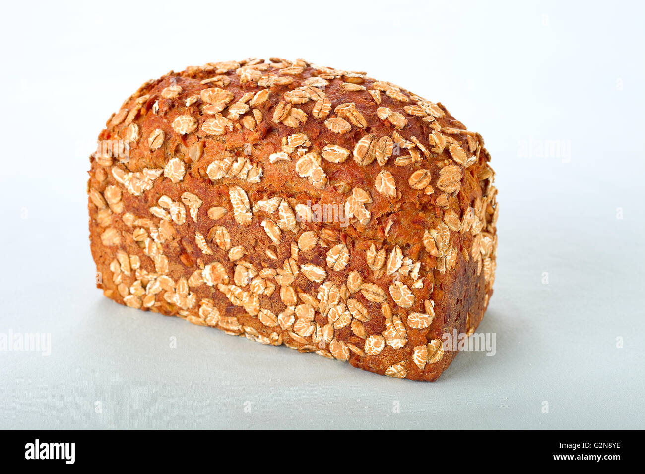 Oat topped whole grain bread Stock Photo Alamy