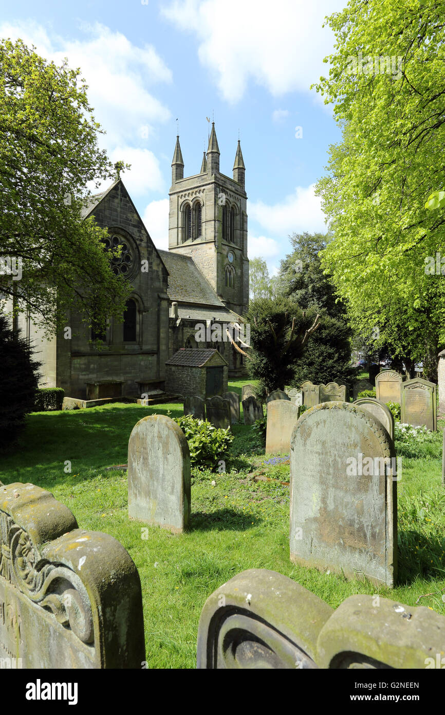 All Saints church, Helmsley, North Yorkshire, England, UK, showing part of the graveyard in the foreground. Stock Photo