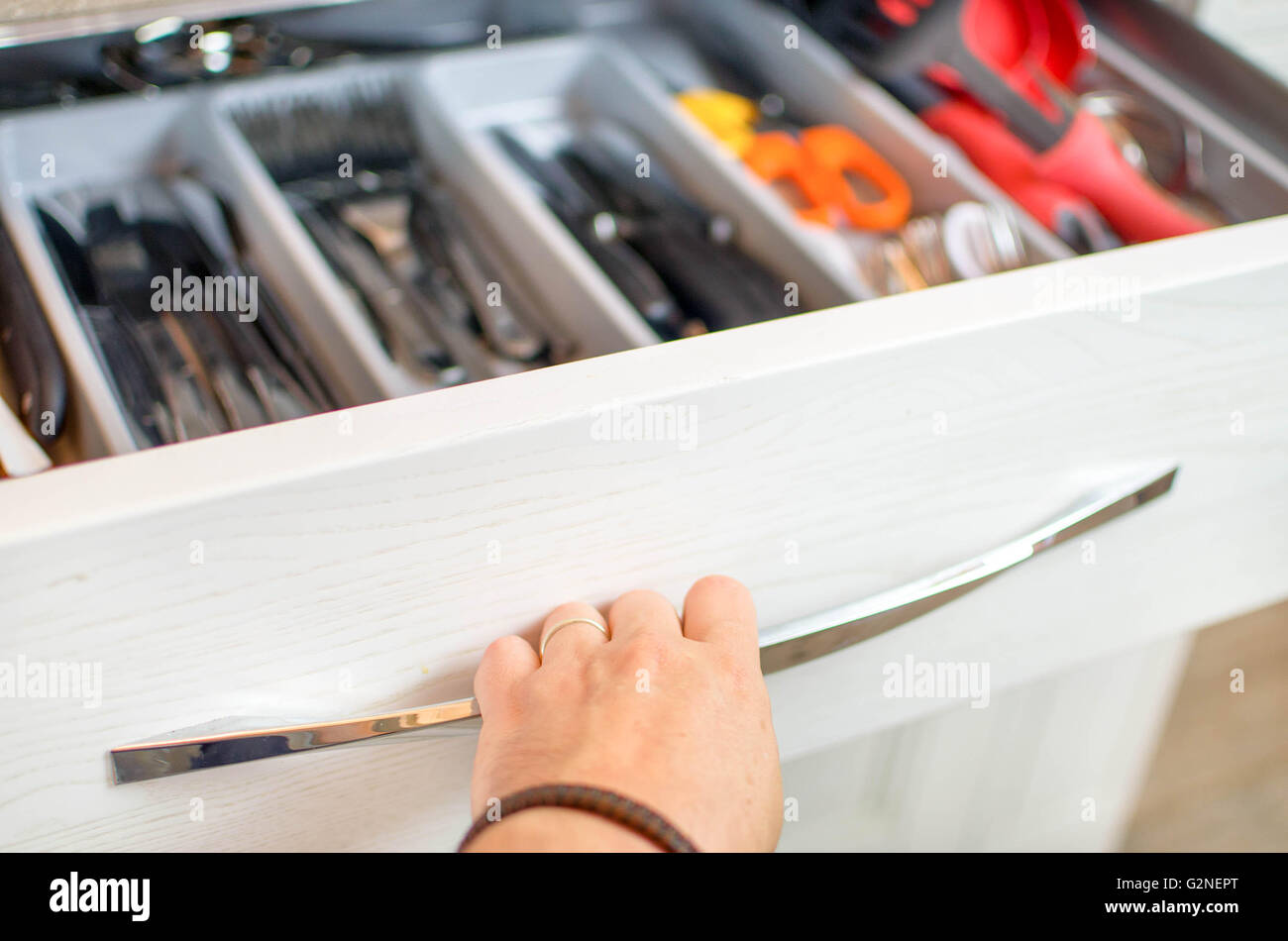 hand open cutlery drawer Stock Photo Alamy