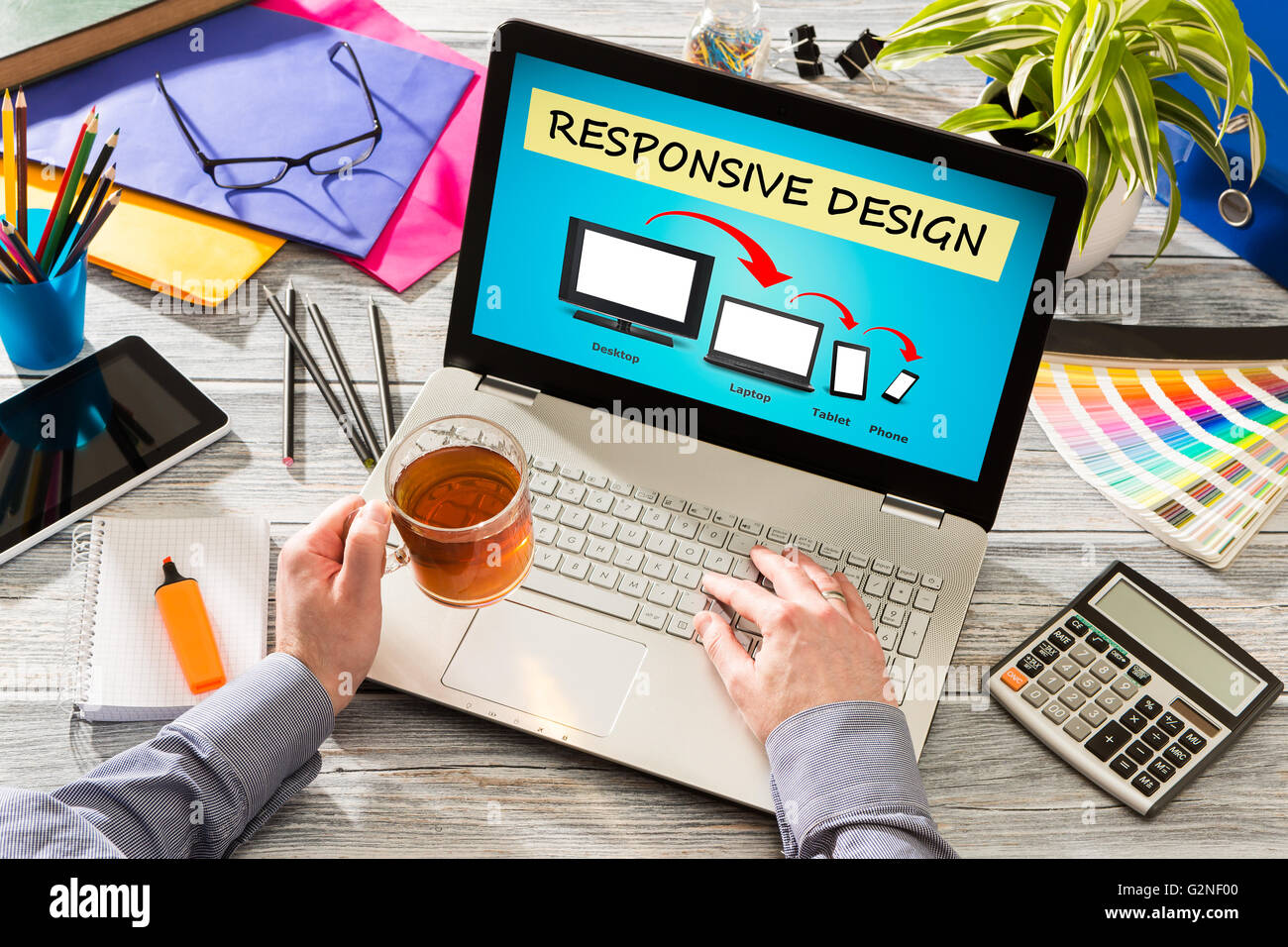 Designer's desk with responsive web design concept Stock Photo - Alamy