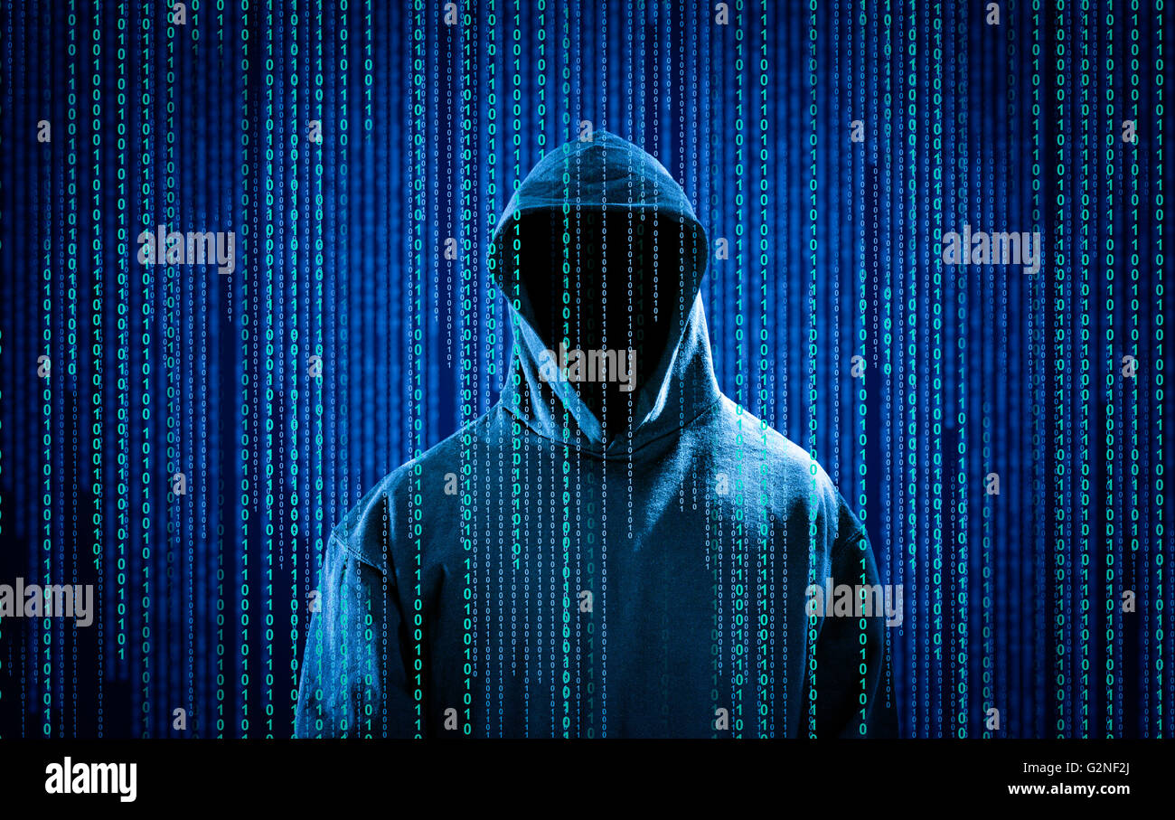 Hacker with a hood and binary code. Hacking the Internet. Stock Photo