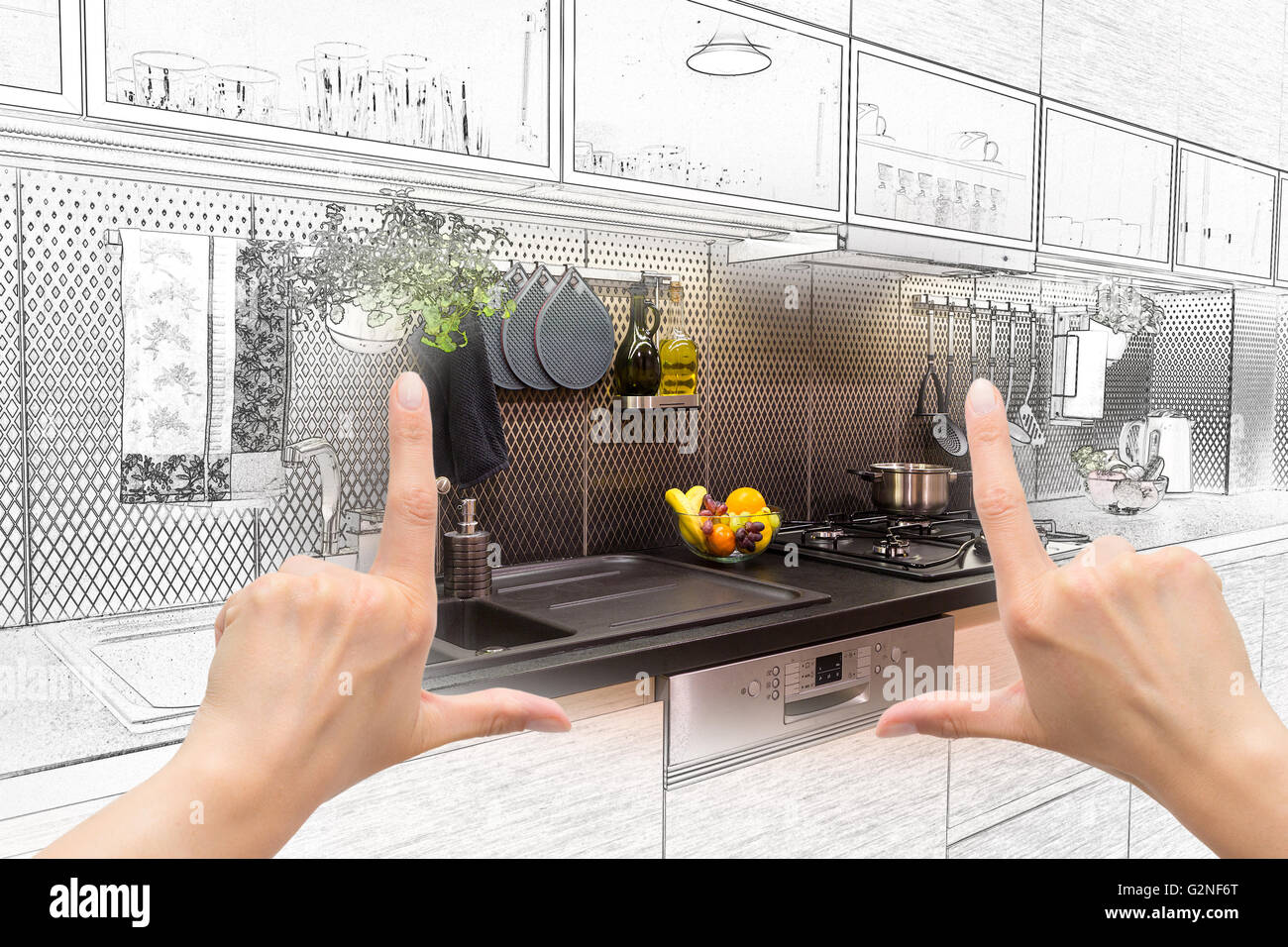 Female hands framing custom kitchen design. Combination drawing and photo. Stock Photo