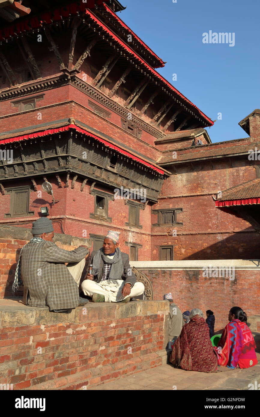 Two old Nepalese men discussing at Durbar Square, Patan, Nepal Stock Photo