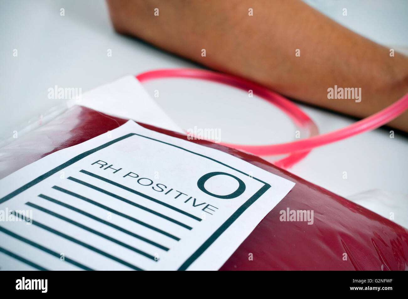 closeup of a blood bag with a label with the text O RH positive on the doctors office Stock Photo