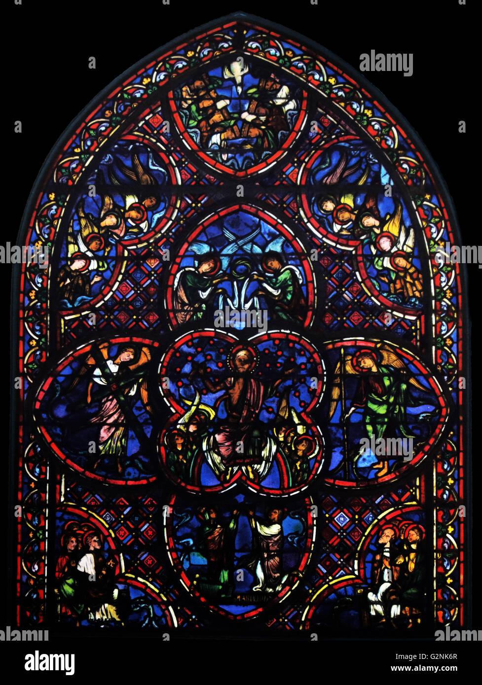 Stained glass window from Bourges Cathedral, France. Shows Christ in judgement below him kneeling are shown Mary the Virgin and St John 13th century Stock Photo