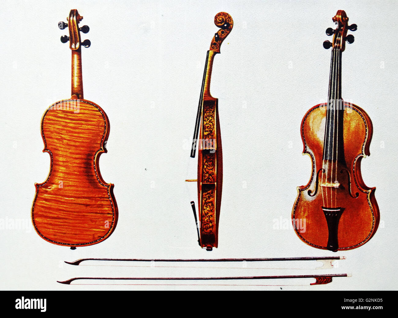 Violin, The Hellier Stradivarius and two old bows noted for the fluting. The 'Hellier' Stradivarius Violin is considered to be one of the perfect earlier works of the instrument. Stock Photo
