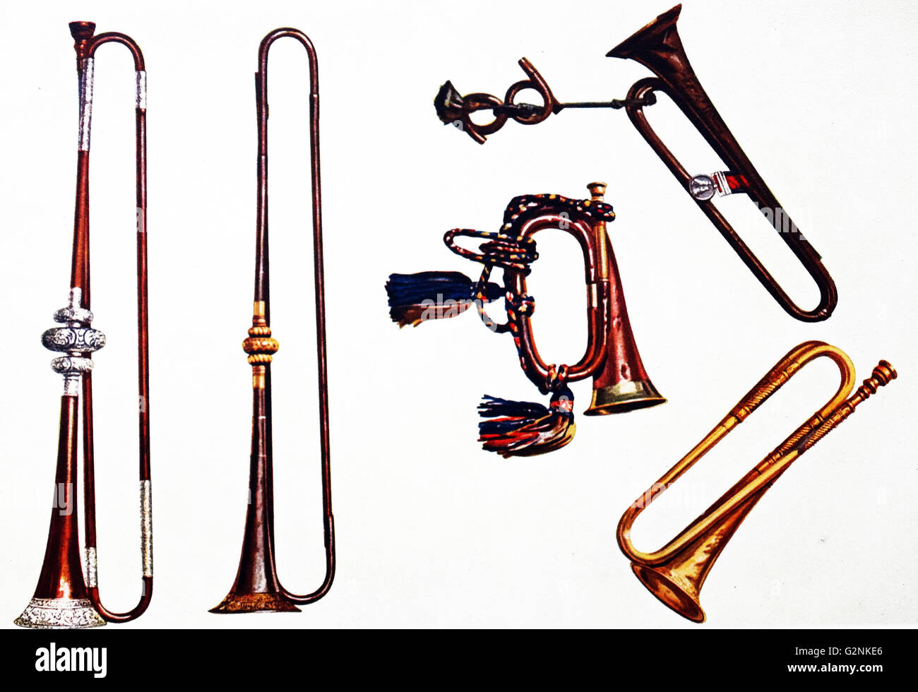 Cavalry Bugle (with tassels), Cavalry Trumpet (embossed) and Trumpets. Three instruments with crooks, gilt and silver mounted. Some of the instruments were carried in the British Army. Stock Photo