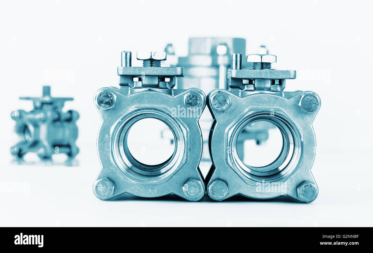 Group 3 valves, different sizes, ball valve with selective focus on thread fittings Stock Photo