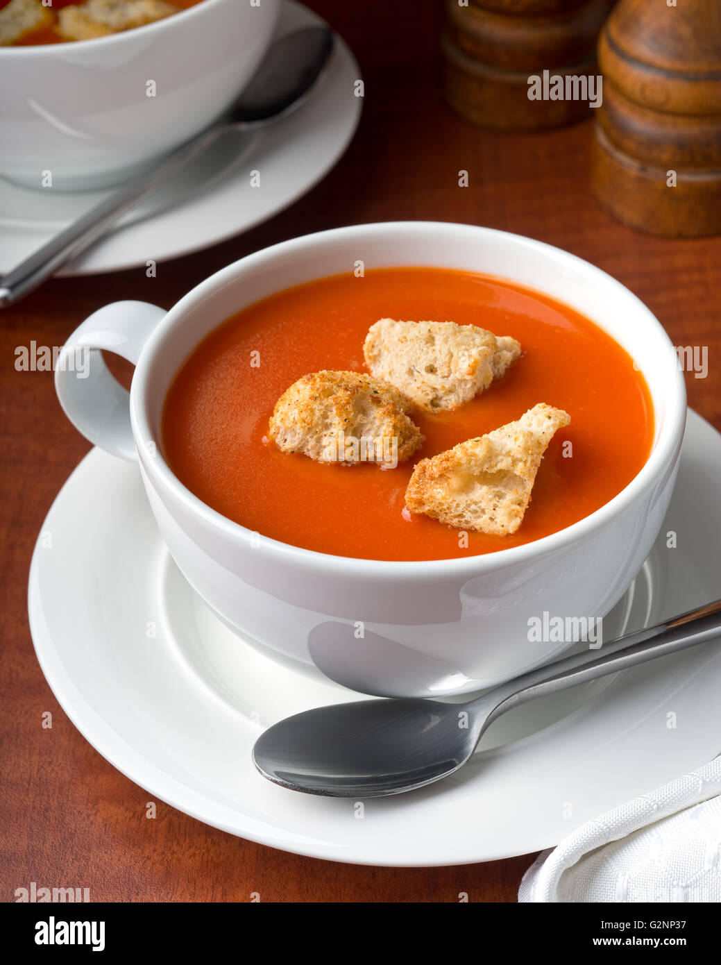 A bowl of delicious tomato soup with home made croutons. Stock Photo