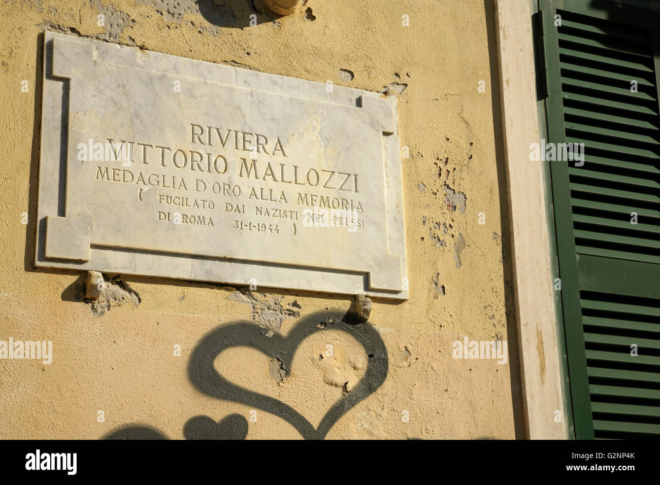 Memorial plaque to Italian anti-fascist resistance fighter Vittorio Mallozzi, shot by Nazis in 1944. Stock Photo