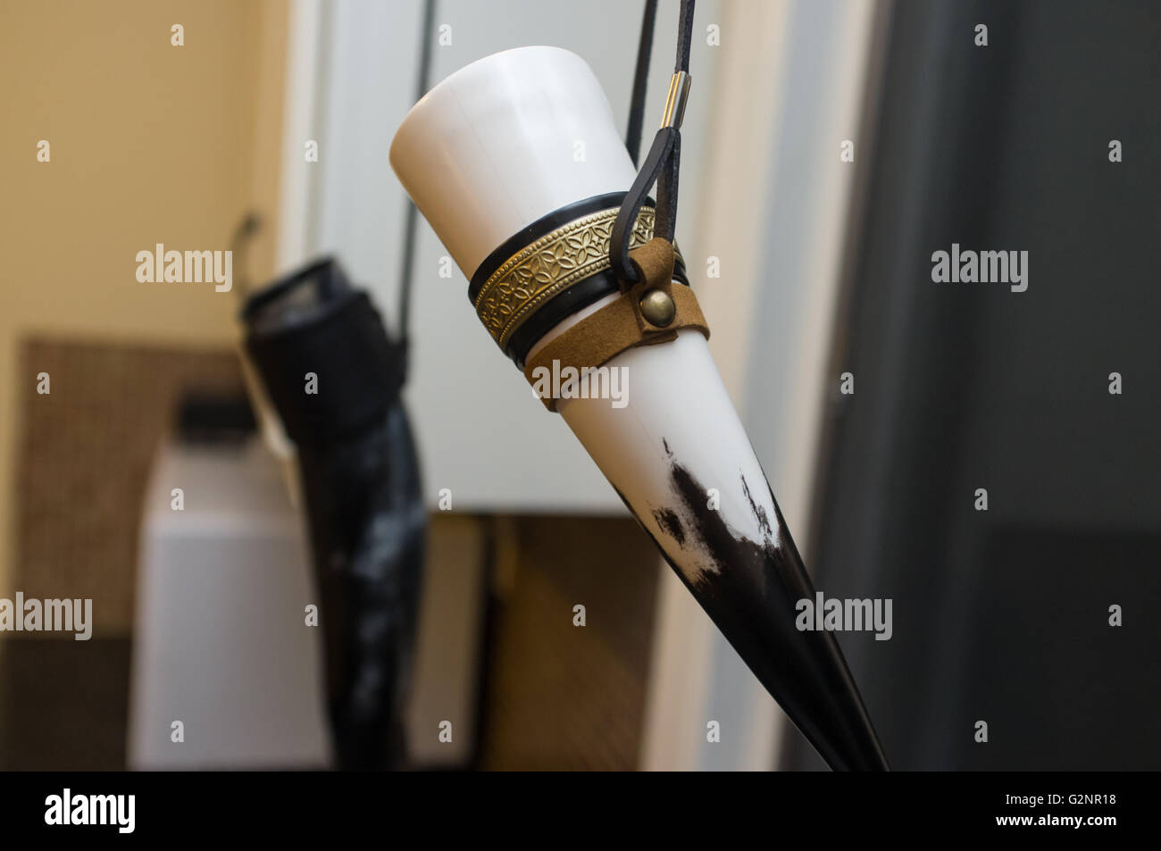 Hanging medieval traditional drinking horn cup decoration Stock Photo