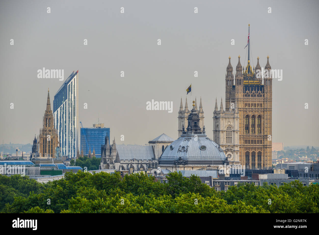 London, UK, circa 2013: Central Hall Westminster, Westminster Abbey, the towers of the Palace of Westminster and Strata SE1. Stock Photo