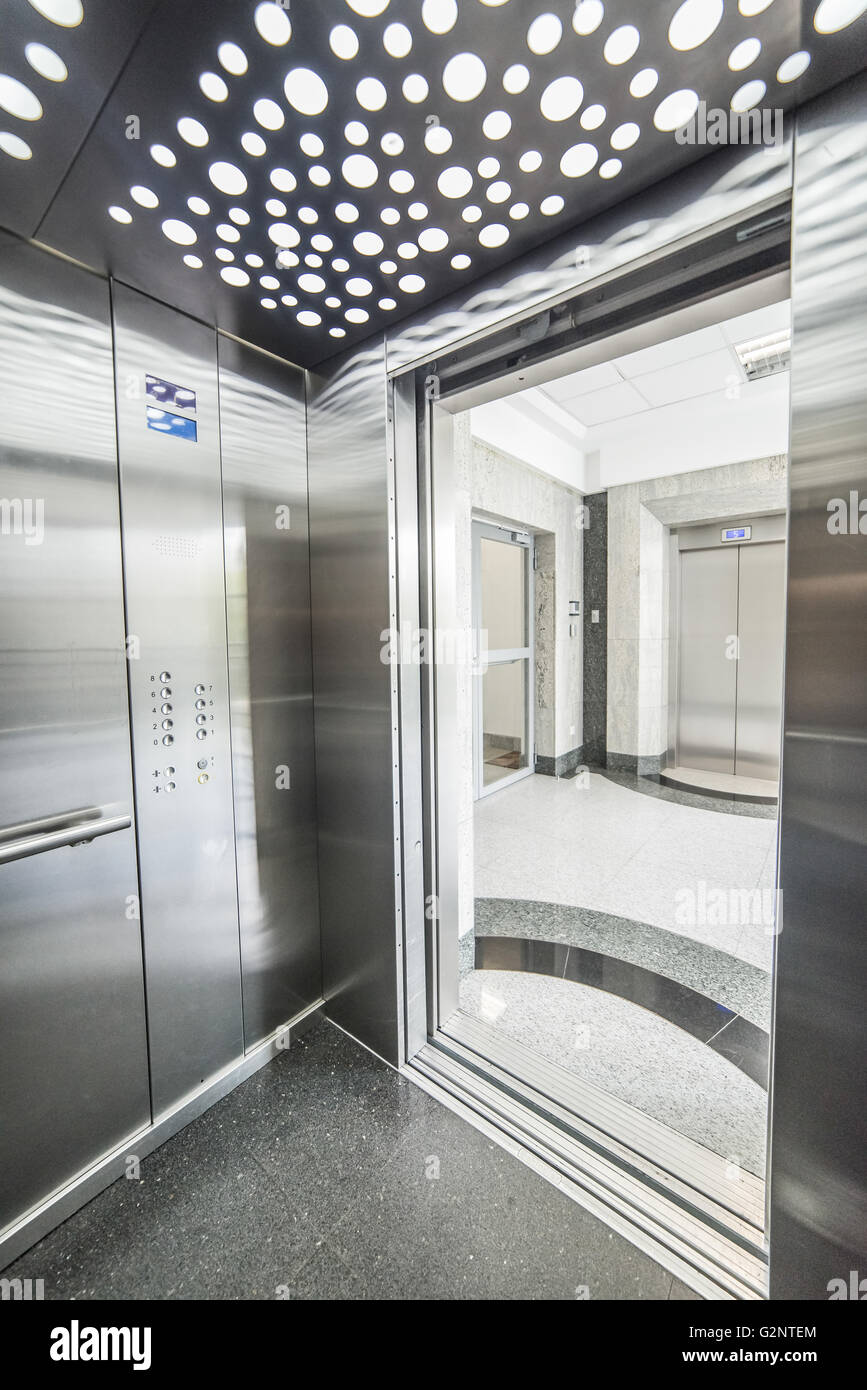 interior of a modern elevator - shiny steel and lighting Stock Photo - Alamy