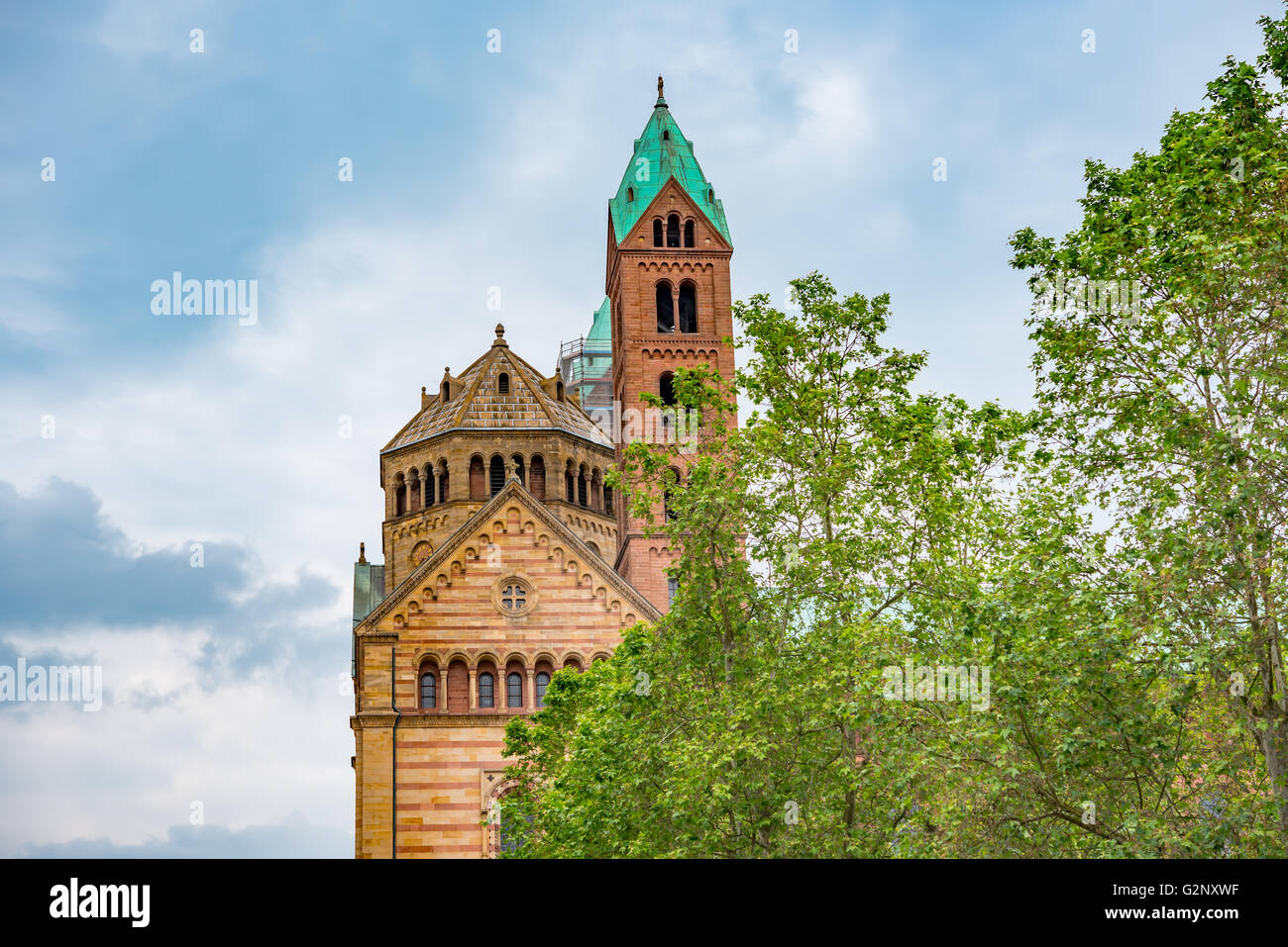 old historic church, cloudy sky and trees Stock Photo - Alamy