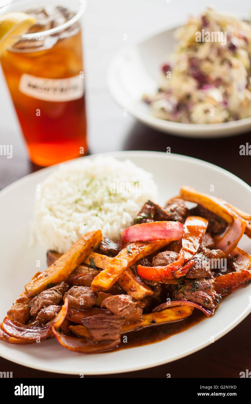 lomo saltado with rice and a side of  tropical slaw, Mouthful Eatery, Thousand Oaks, California Stock Photo