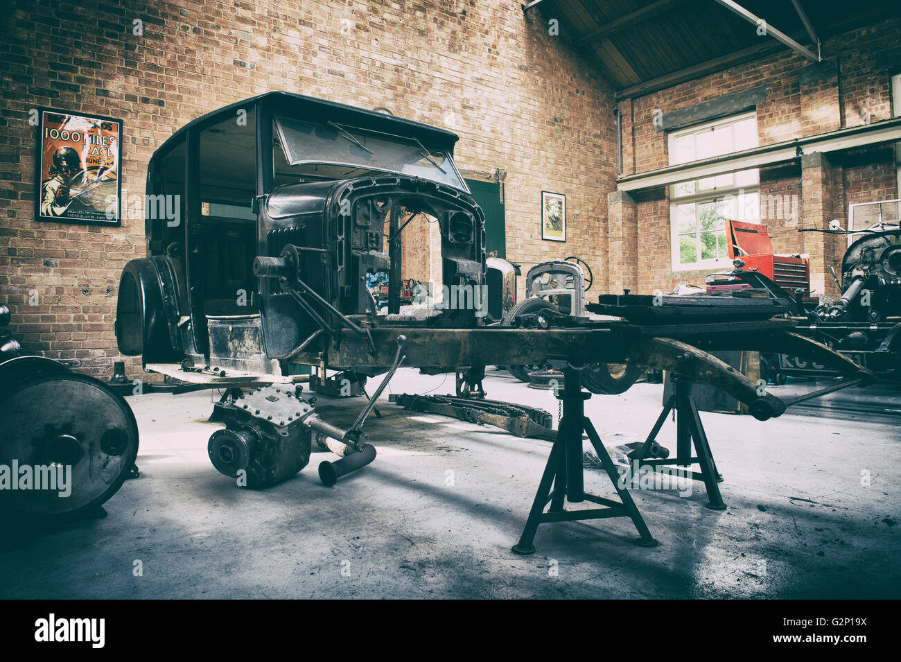 Vintage Bentley restoration workshop at Bicester Heritage Centre. Oxfordshire, England. Vintage filter applied Stock Photo