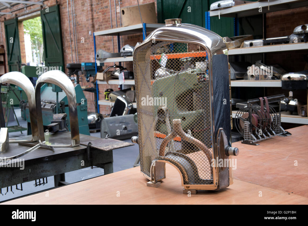 Vintage car radiator restoration at Bicester Heritage Centre. Oxfordshire, England