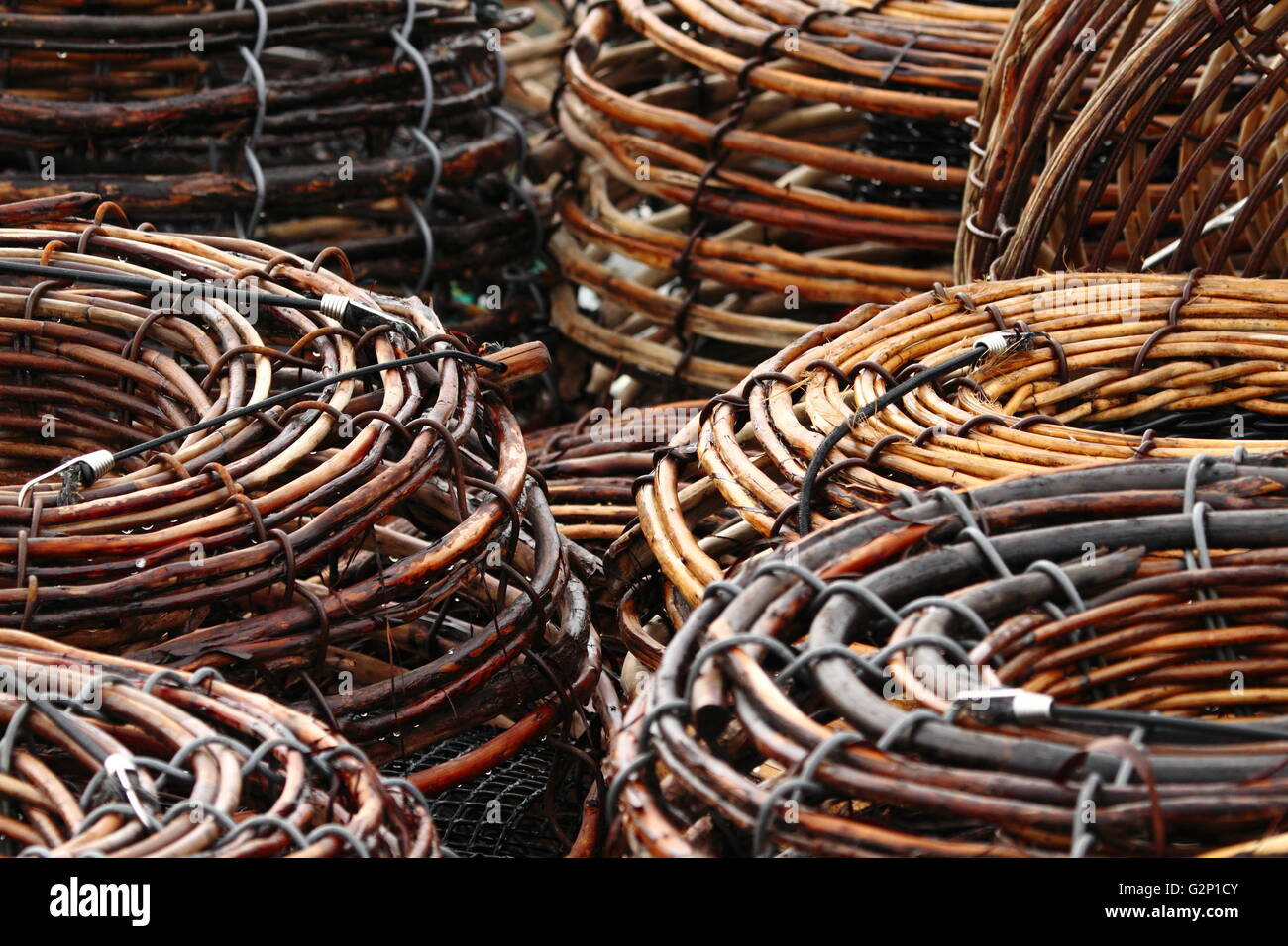 Rock Lobster Pots stacked on the deck of a fishing boat in Constitution Dock, Hobart, Tasmania, Australia. Stock Photo