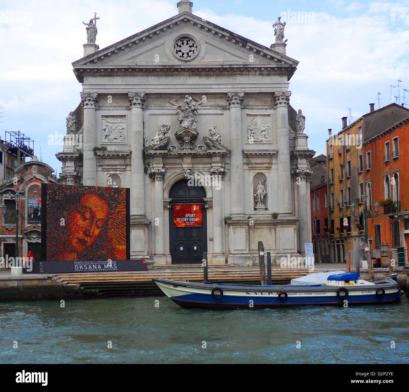 The San Stae church in Venice, Italy. Located in the Santa Croce quarter in  the centre of the city. Photographed from the Grand Canal, showing the  sculptural features on the architecture Stock