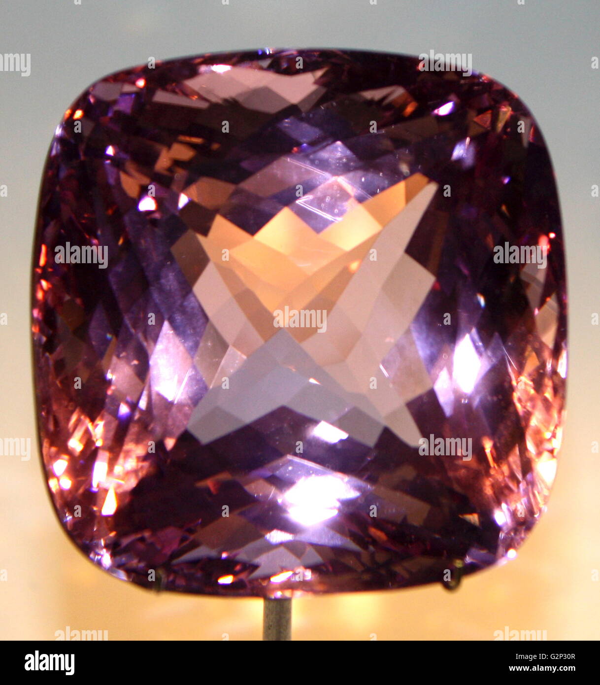 A flawless cut Morganite gem, (formerly called pink beryl until 1910). Found in Madagascar and cut to display it's brilliance and clarity. Stock Photo
