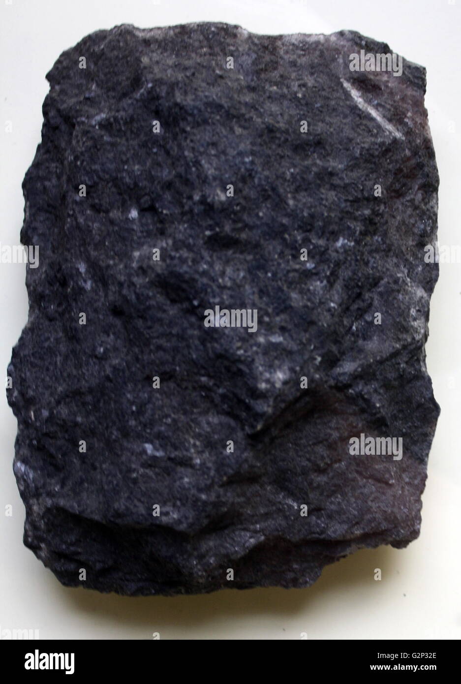 A large piece of Peridotite. An ultramafic, dense coarsegrained