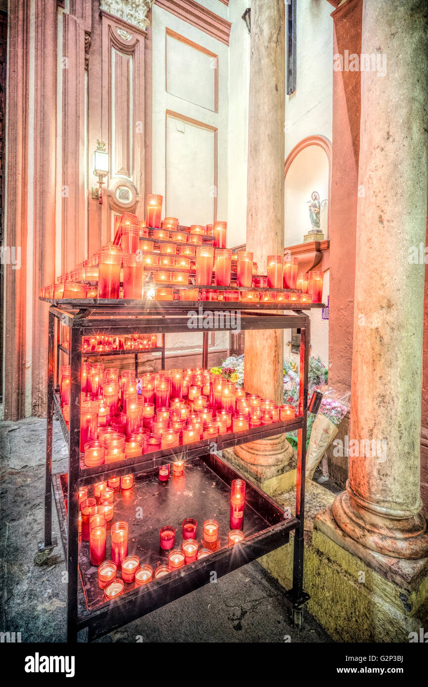 Votive candles devoted to San Judas Tadeo (Saint Jude Thaddaeus