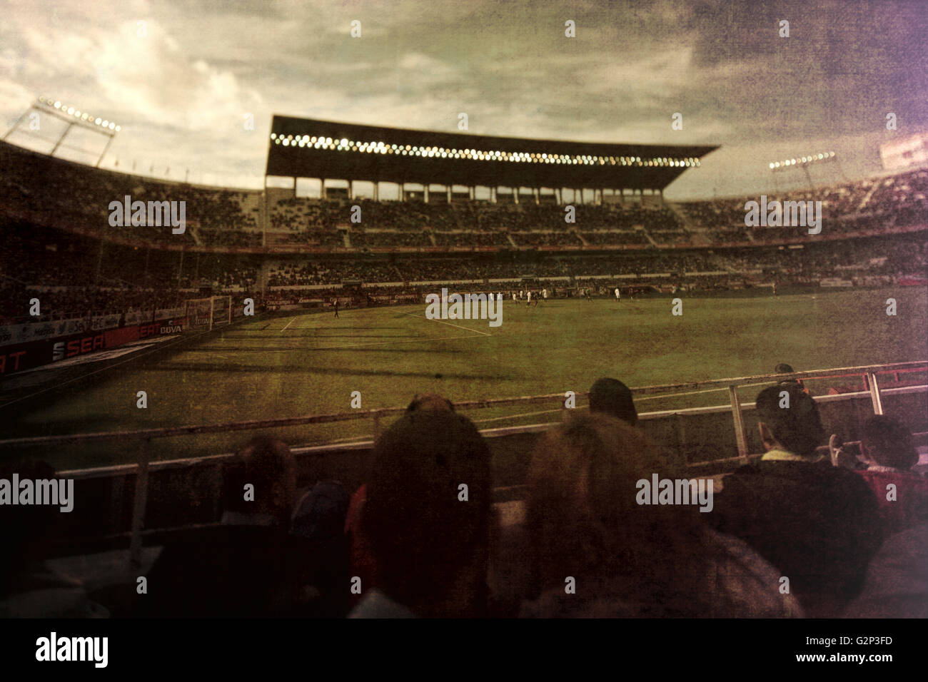 Spectators watching a football match. Ramon Sanchez-Pizjuan stadium, Seville, Spain Stock Photo