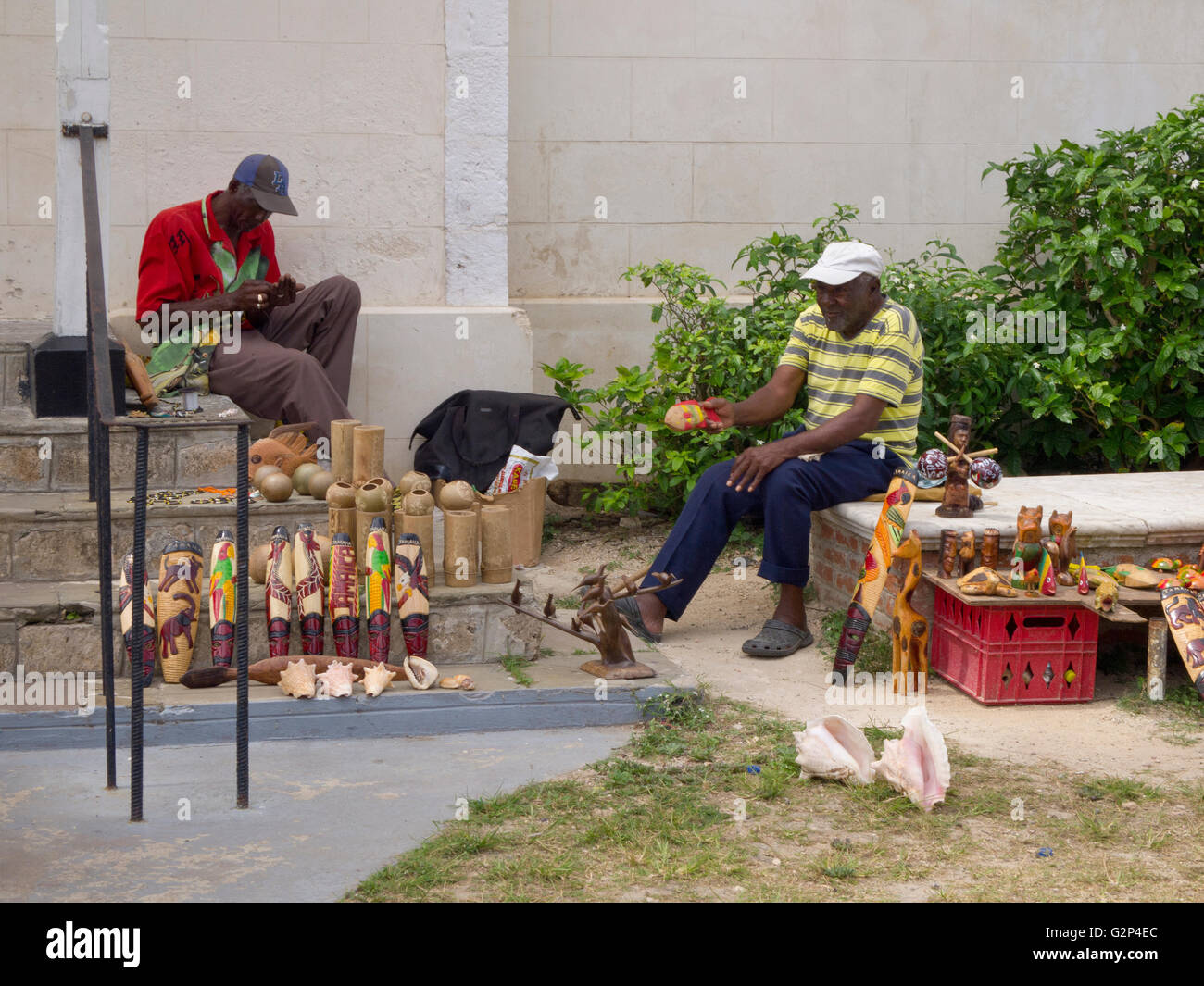 Street vendors carving wood in Falmouth Jamaica Stock Photo Alamy