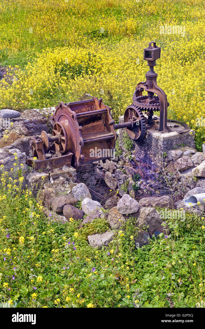 Old traditional draw-mill mecanism, at Turtle's plateu in Methana peninsula found in the Saronic gulf, Greece Stock Photo