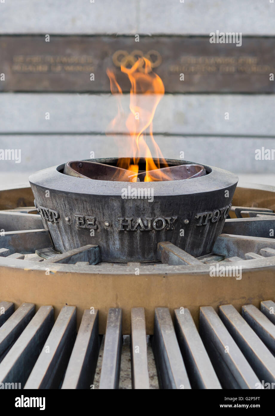 The eternal Olympic flame is burning outside the Olympic Museum (musee olympique) in Lausanne, Switzerland, home of the IOC. Stock Photo