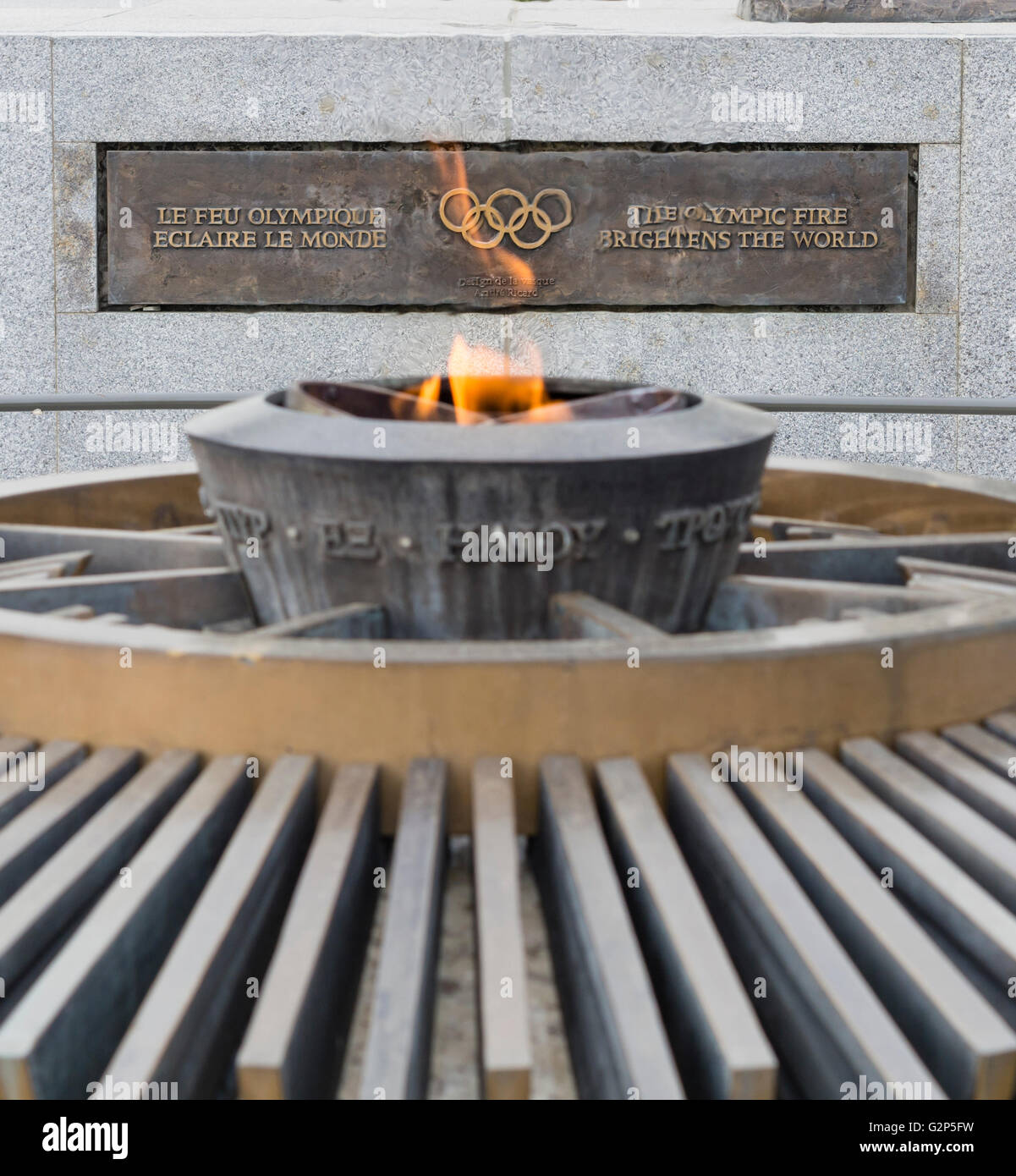 The eternal Olympic flame is burning outside the Olympic Museum (musee olympique) in Lausanne, Switzerland, home of the IOC. Stock Photo