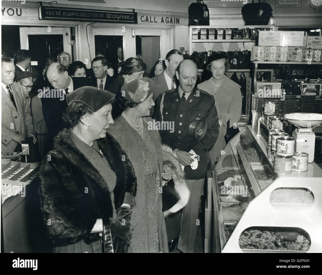 First Lady Mamie Eisenhower and Queen Mother Elizabeth examine the nut counter at a Washington, DC drug store. Photo: Abbie Rowe Stock Photo