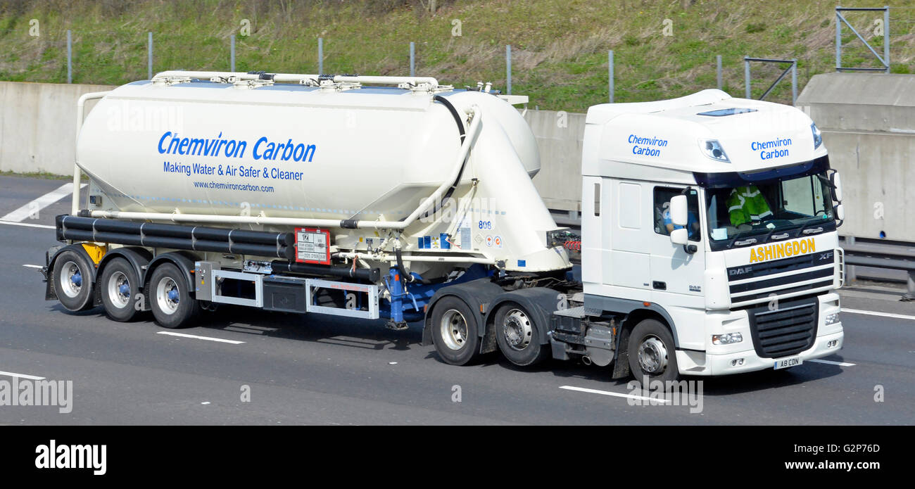 Transportation logistics via Chemviron Carbon hgv lorry & tanker trailer on English M25 motorway carrying non hazadous steam activated granular carbon Stock Photo