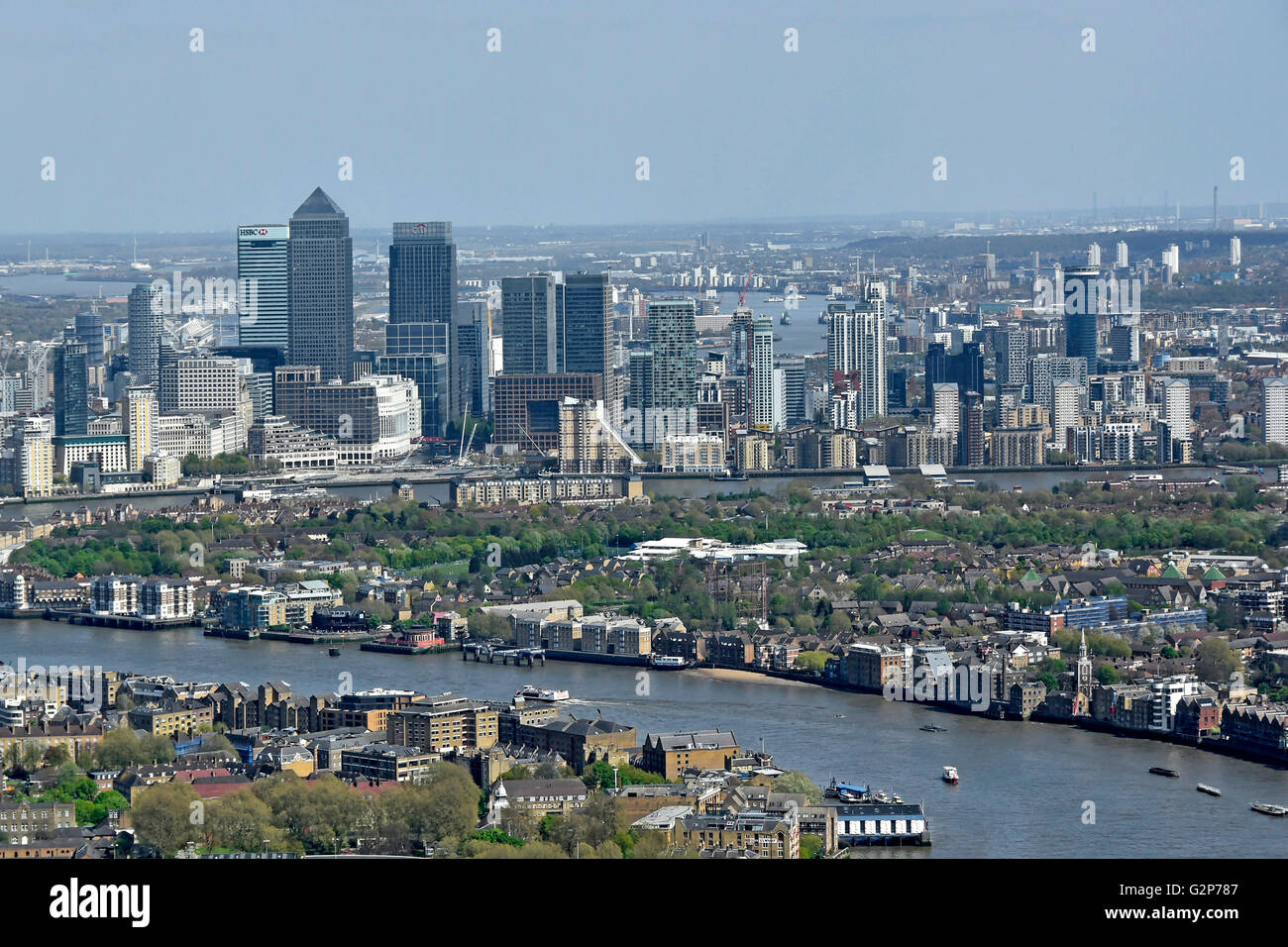 Aerial view looking down from above at the River Thames and London skyline cityscape at Canary Wharf in Isle of Dogs London Docklands England UK Stock Photo