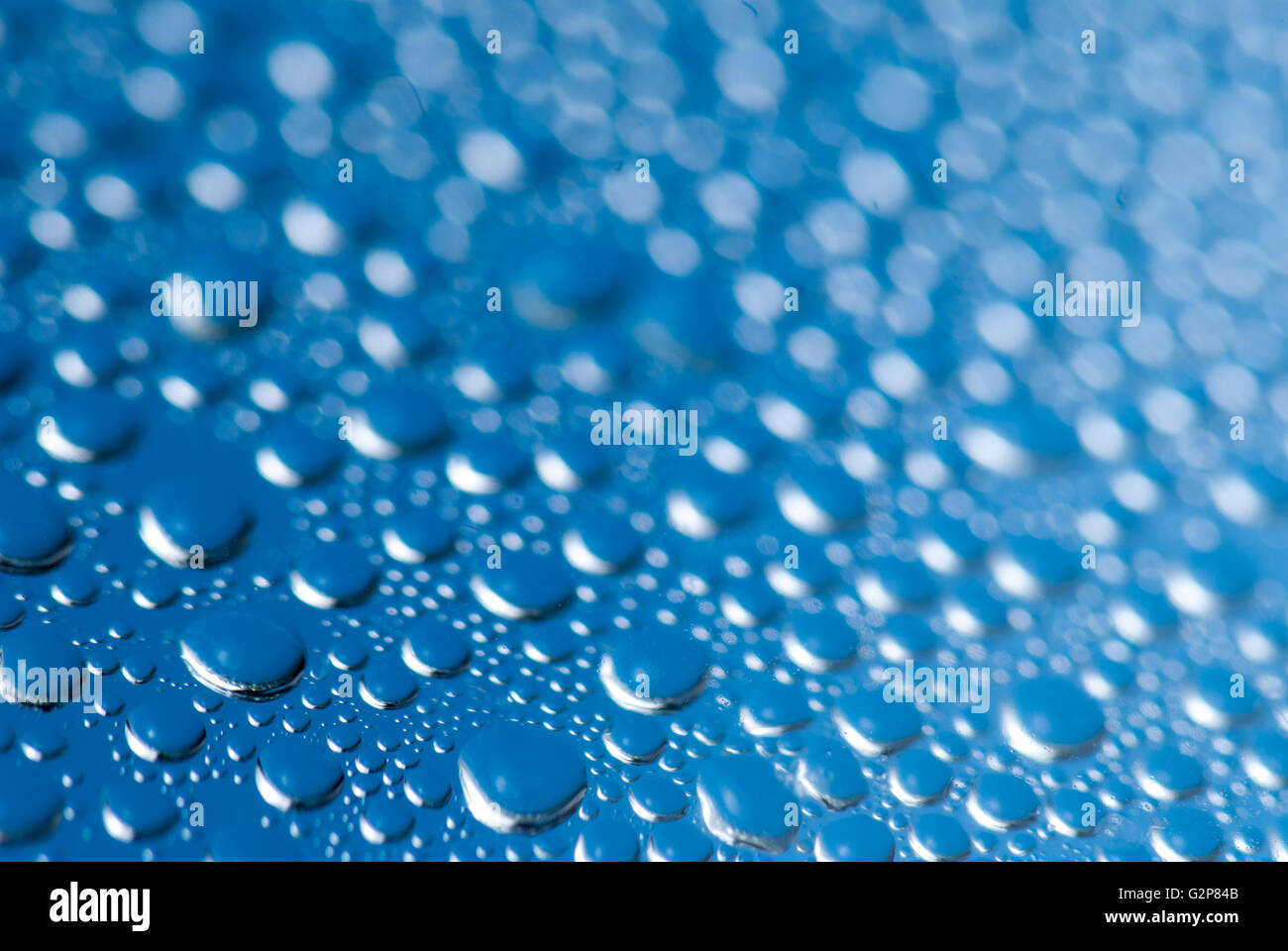 close-up of water drops on the blue background Stock Photo - Alamy