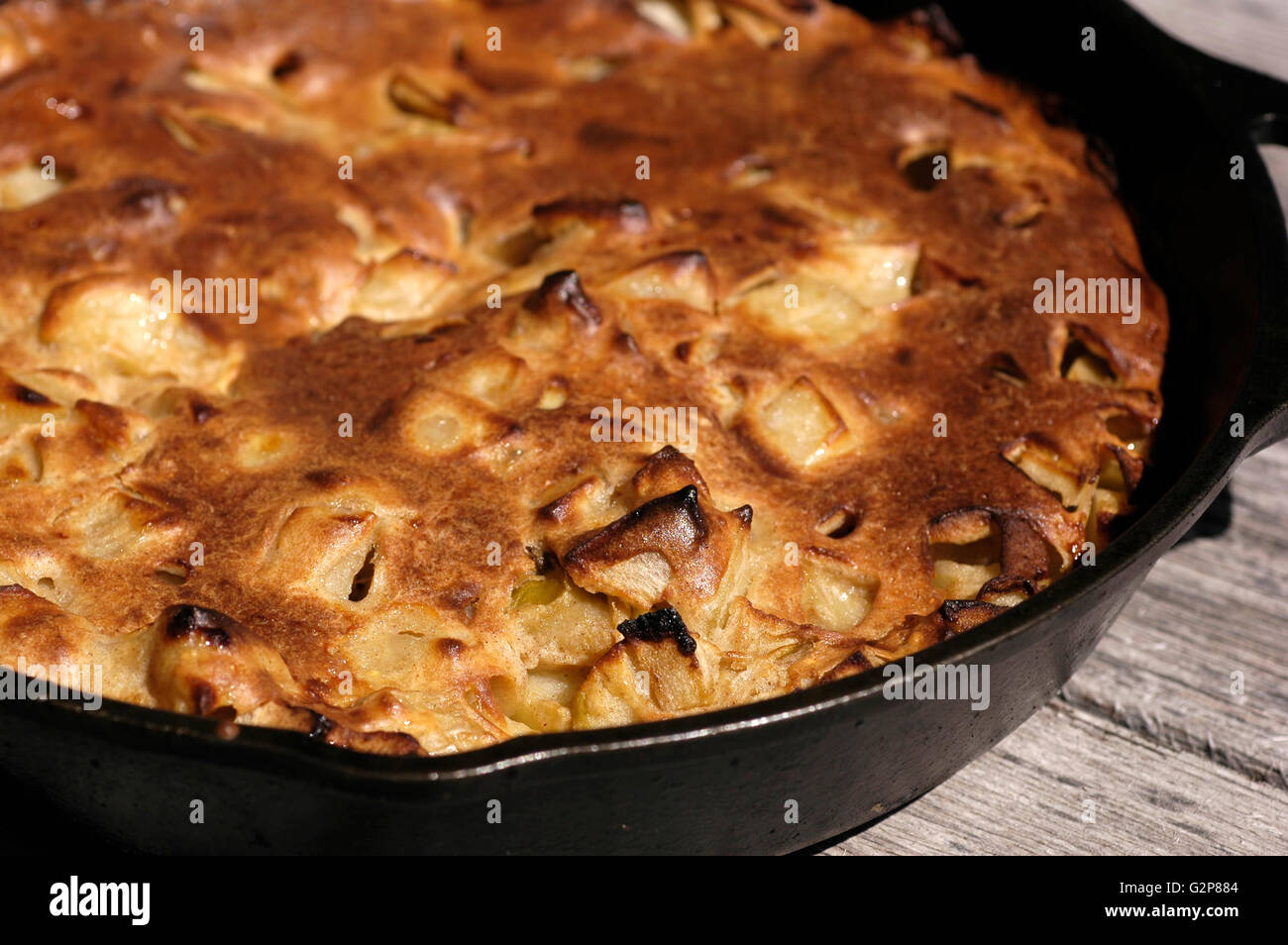 Apple pancake in a cast iron skillet Stock Photo Alamy