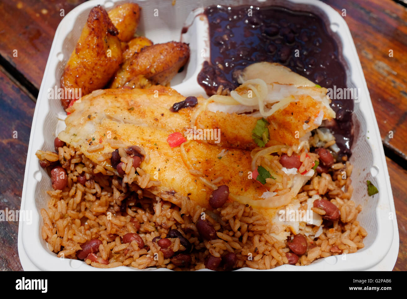 Cuban Restaurant dinner, consisting of Fried Fish, black beans, rice