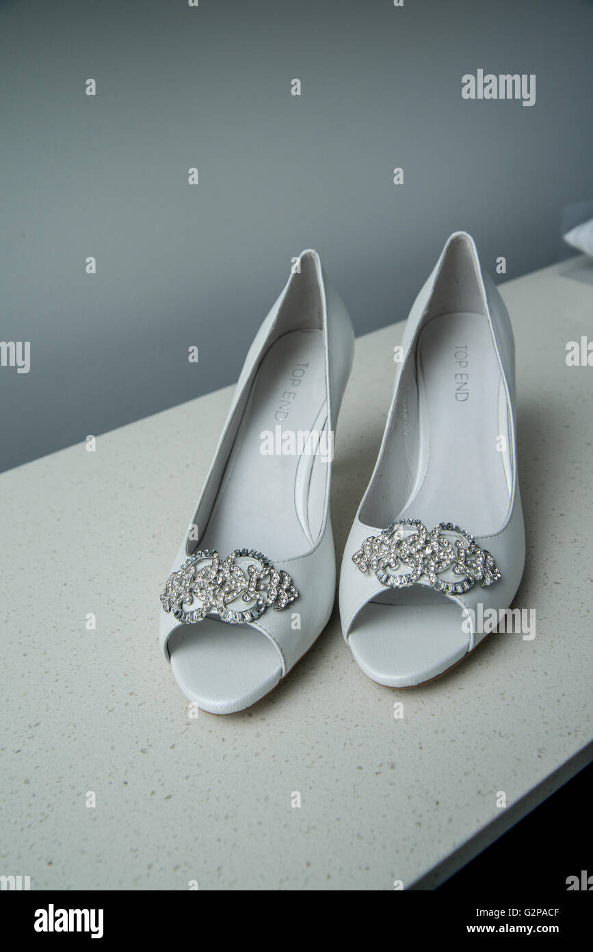 beautiful high heels  with diamonds on top of table Stock Photo