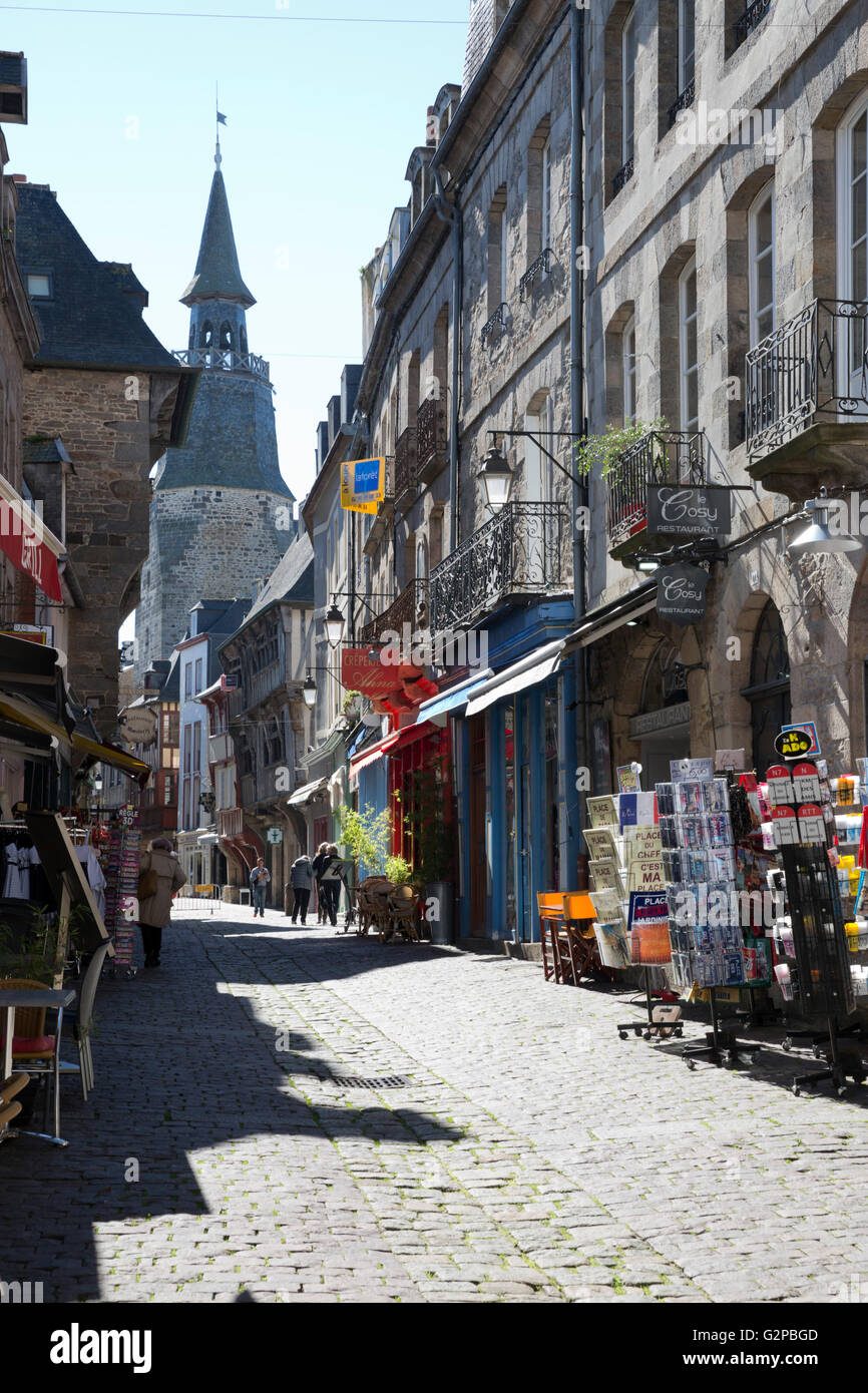 View along cobbled street to Tour de l'Horloge, Rue de la Poissonnerie, Dinan, Cotes d'Armor, Brittany, France, Europe Stock Photo