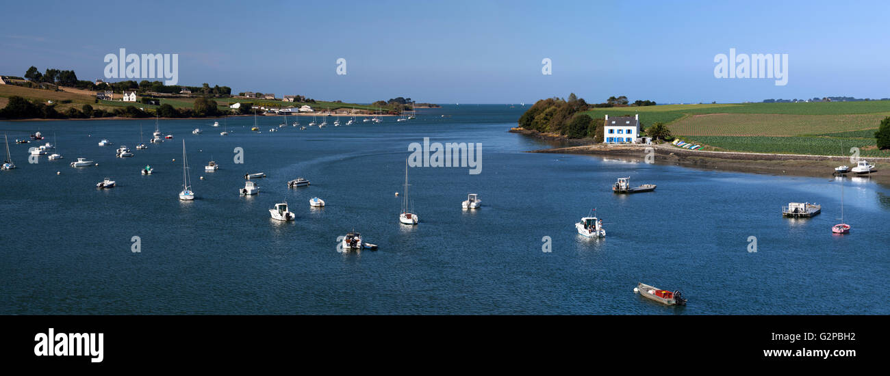 Typical French cottage on Penze estuary viewed from Pont de la Corde, near Carantec, Finistere, Brittany, France, Europe Stock Photo