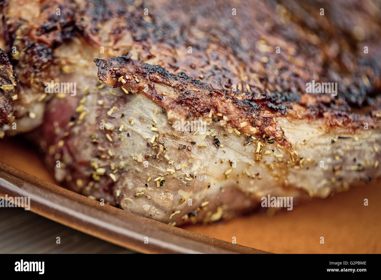 Grilled Beef Cutlet at the barbecue Cut into slices for serving Stock Photo