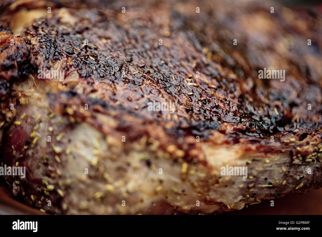 Grilled Beef Cutlet at the barbecue Cut into slices for serving Stock