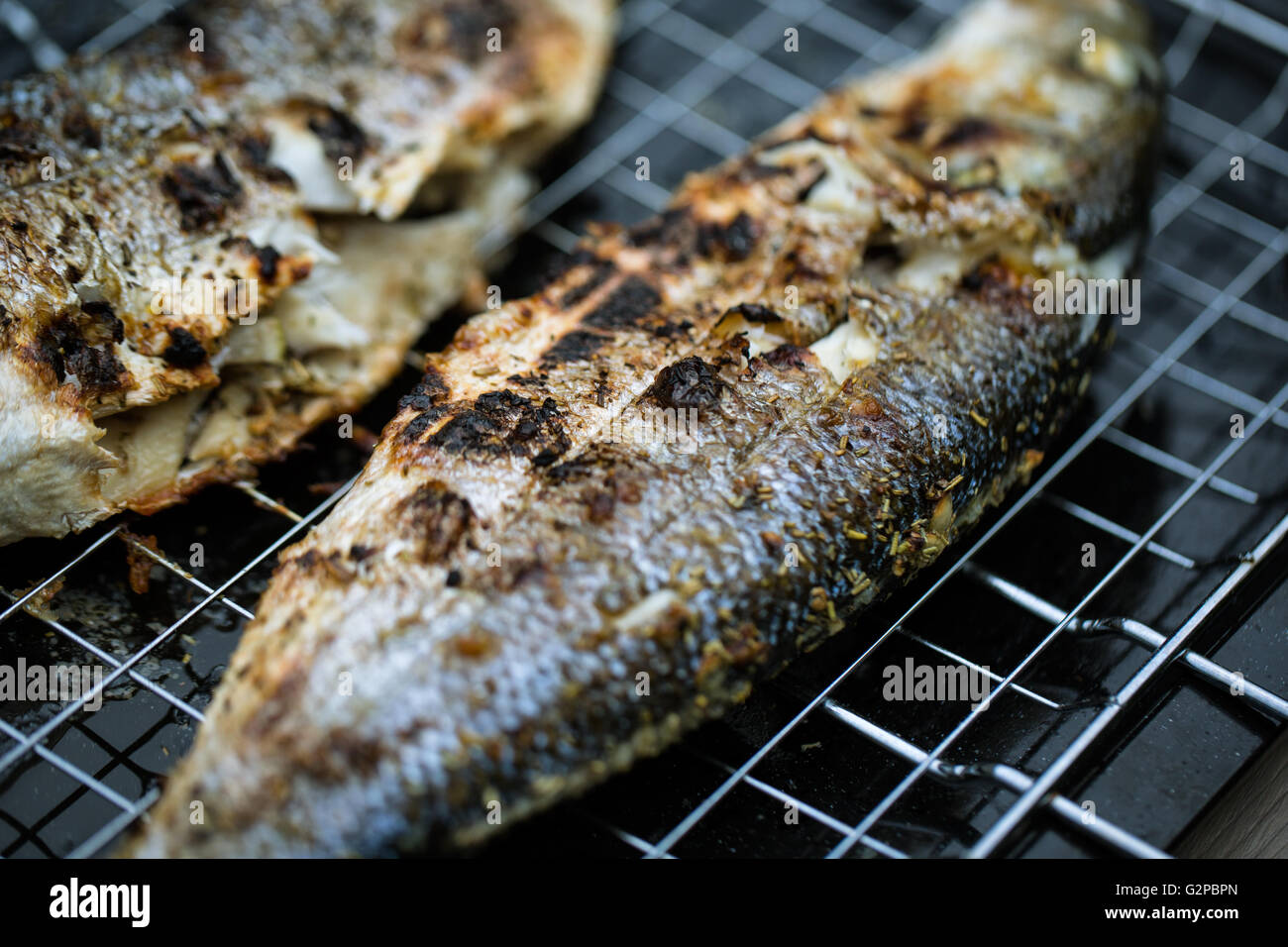 Fresh Grilled Sea Bass at the Barbecue Stock Photo Alamy