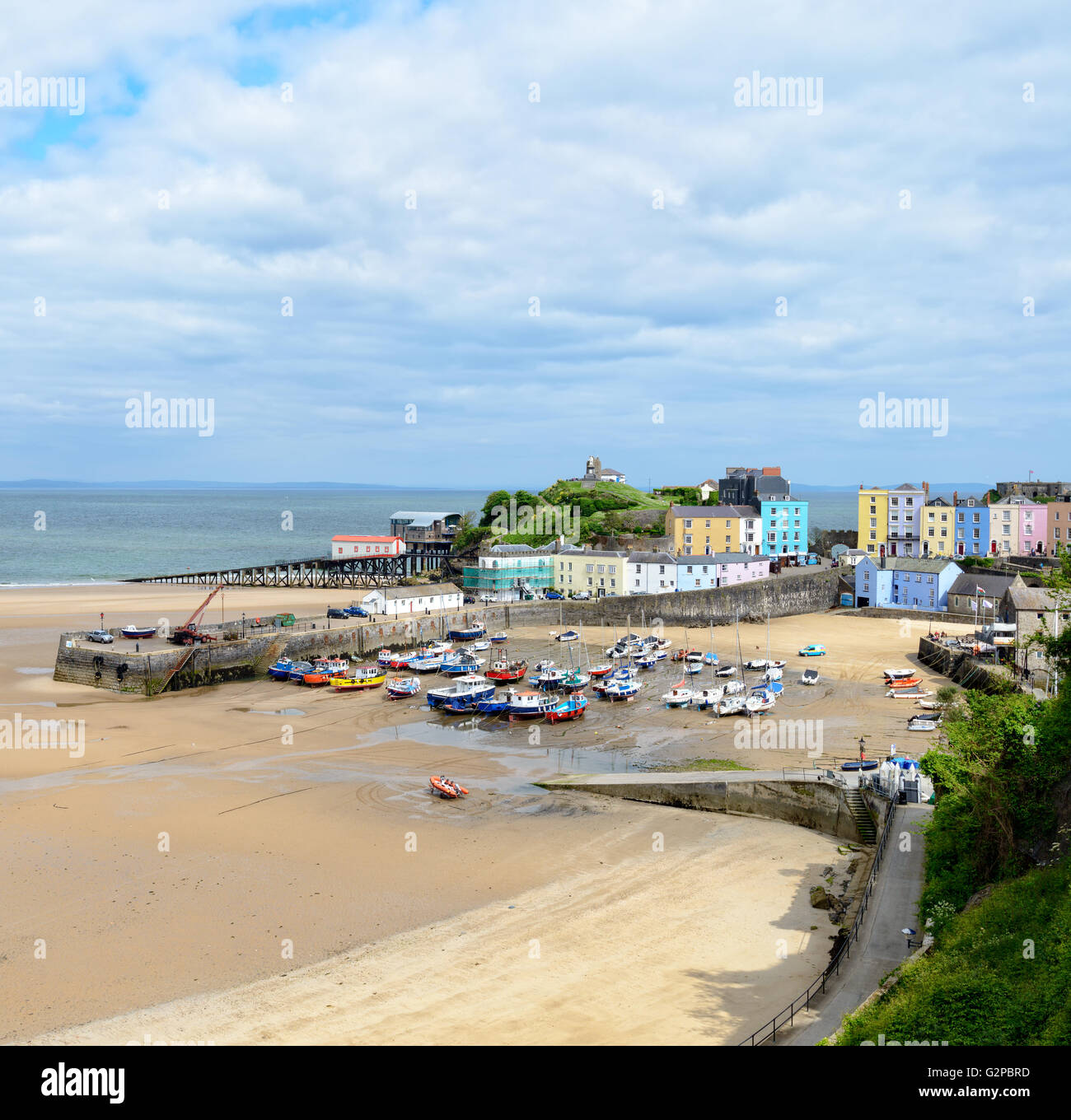 Colourful seafront houses on the harbour at Tenby, a picturesque fishing port on the Pembrokeshire coast in Wales Stock Photo