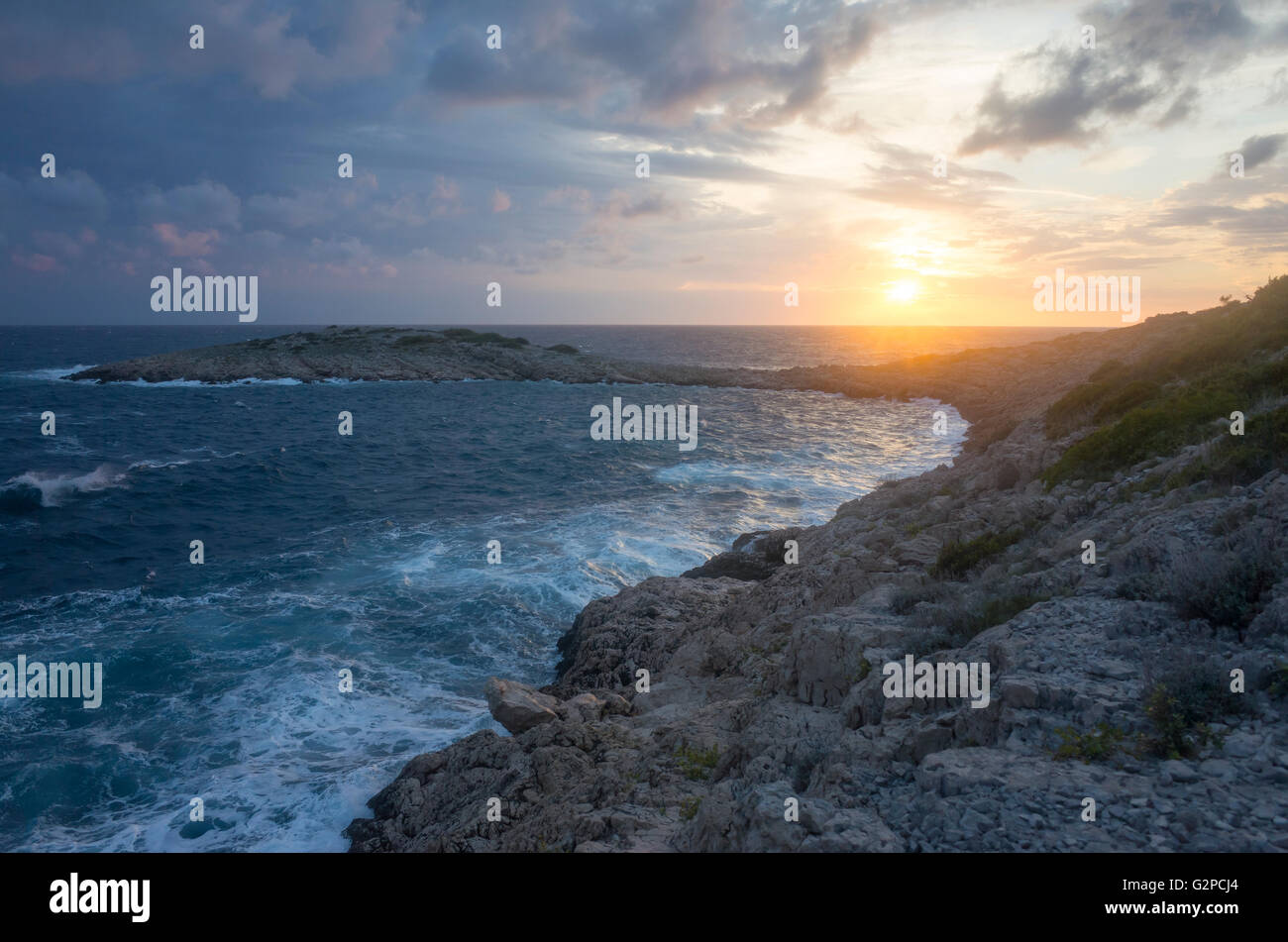 Razanj Croatia Europe. Landscape and nature photo. Adriatic Sea at dawn and sunset. Stormy warm summer evening with beautiful colors and tones. Stock Photo