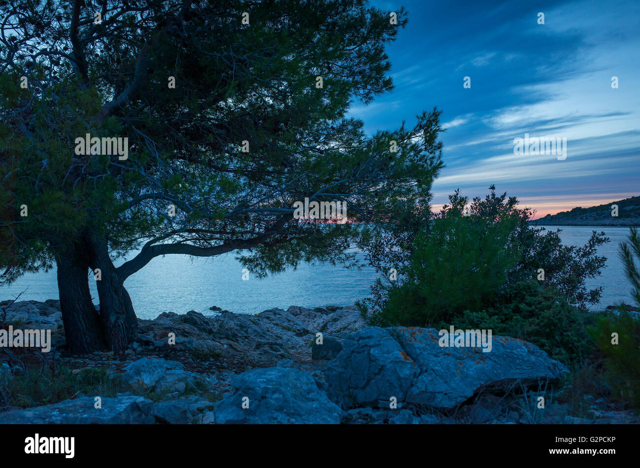 Razanj Croatia Europe. Landscape and nature photo. Adriatic Sea at dawn after sunset. Calm warm summer evening with beautiful colors and tones. Stock Photo