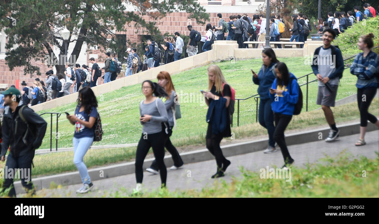 June 1, 2016. Westwood CA. Students make their way out of class rooms after the lockdown was lifted. Today at UCLA after a murder-suicide Wednesday morning at UCLA left two dead, and prompted a campus-wide lockdown, according to the Los Angeles Police Department.'At about 10 this morning, a homicide and a suicide occurred on the southside, ' Los Angeles Police Chief Charlie Beck said in a news conference. 'It appears it was entirely contained. We believe there are no suspects outstanding and no continued threat to UCLA campus. We're in the process of releasing the campus. (Credit Image: © Stock Photo